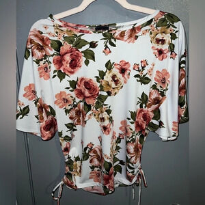 First Love floral top with front side rouching dolman type sleeves